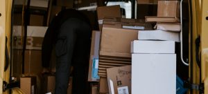 a man dealing with boxes