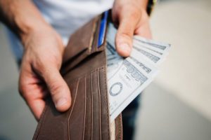 a wallet with some money