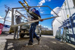 A mover moving glass window