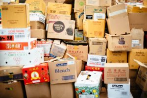 cardboard boxes piled on top of each other