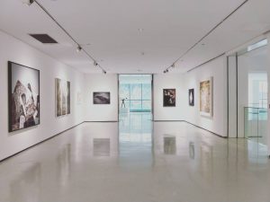 paintings on white painted wall