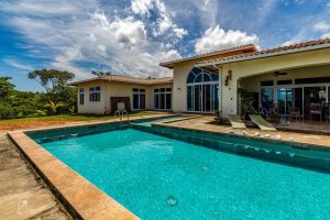 white house with a pool