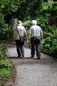 two seniors walking as a part of the best Senior activities in Coral Springs