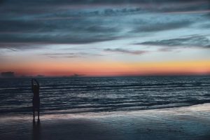 person standing at the beach