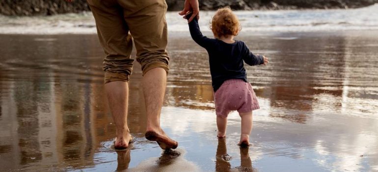 walking on the beach with your family