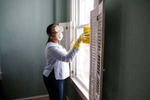 A woman cleaning windows