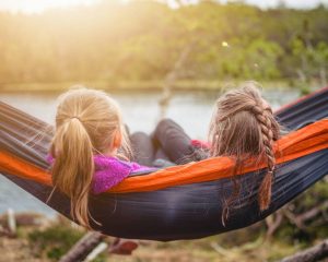 two girls in a hammoc