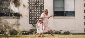 Mother and daughter walking