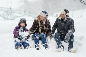 family spending time with their kid during winter break