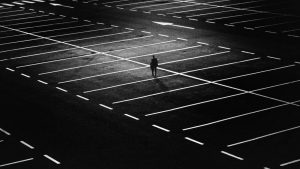 man reserving a parking spot as a way to work with movers and stay safe