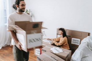 Man and woman packing together