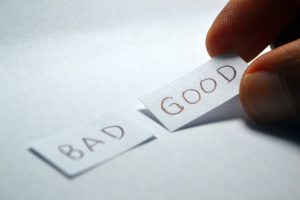 a hand picking good sign as a part of decide between renting and buying guide