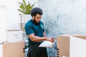 A mover checking boxes