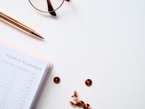 a planner on the desk - Moving your home-office from Davie to Coral Gables