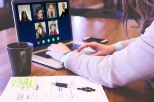 A group of female friends is holding a zoom chat