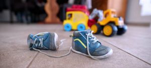 toys and shoes on the floor