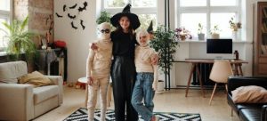 Family in Halloween costumes