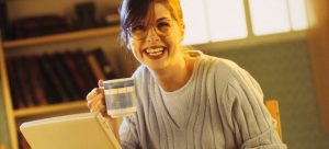 woman smiling because she got a free estimate from a moving company