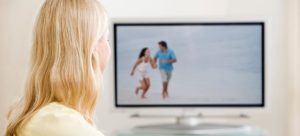 woman watching tv waiting for her new roommate