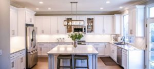 A spacious, white, state-of-the-art kitchen