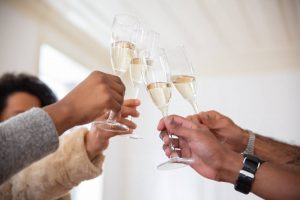 People with glasses making a toast