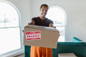 a person holding a box
