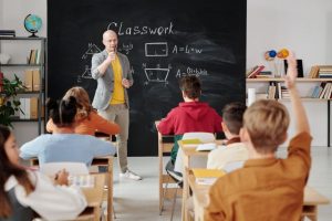 a teacher in front of a class