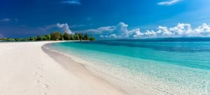 Enjoying a sandy beach after buying a house in Sunny Isles Beach