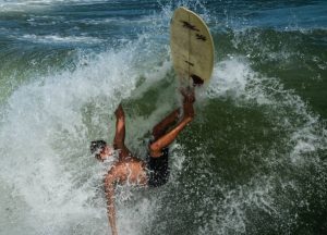A person surfing on sea waves