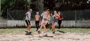 Friends who play football.