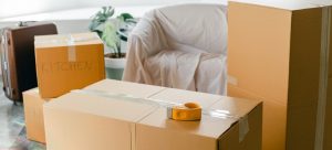 Moving boxes and suitcase