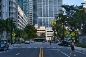 Cars on the road near buildings