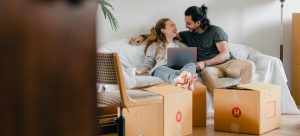 A couple resting after moving to Aventura