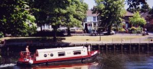 Red and White Boat on River.