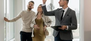 realtor showing home to a couple