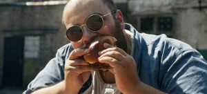 a foodie eating a burger and wondering what are the top Florida spots for foodies