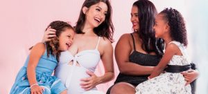 women and kids smiling after finding some of the best Florida cities for low-income families