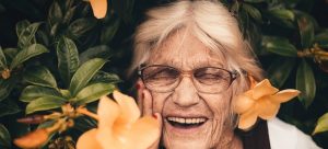 senior smiling and thinking about the best places for seniors in Florida