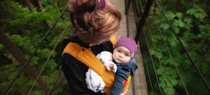 a mom holding a baby