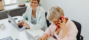 two persons at work
