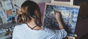 an artist painting a picture