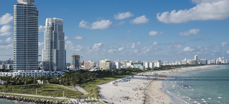 Miami beach with buildings in the background