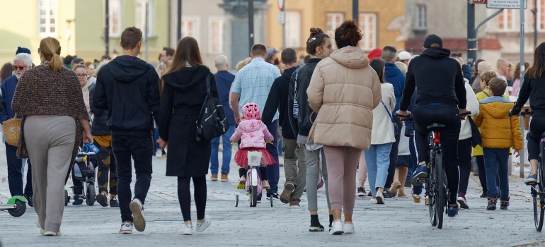 a crowd of people in the street