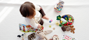 a toddler playing with toys