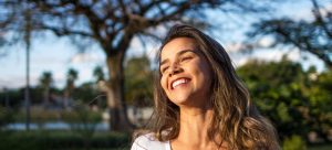 woman is happy while trying to choose a Florida city based on your lifestyle