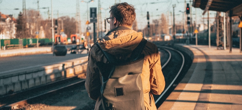 man standing on station