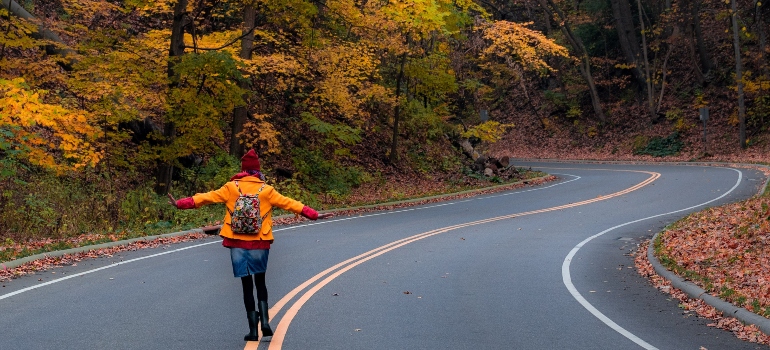 person alone on the road in one of the Best Florida cities for European expats