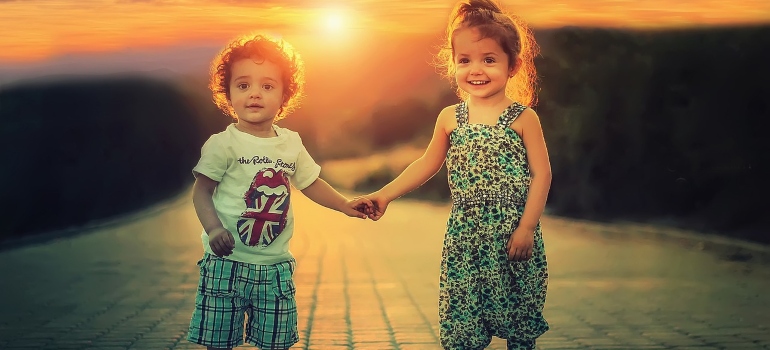 children walking in a park after moving from Coral Gables to Hollywood