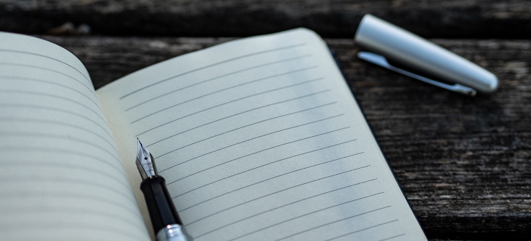Pen and paper for writing the places you need to research