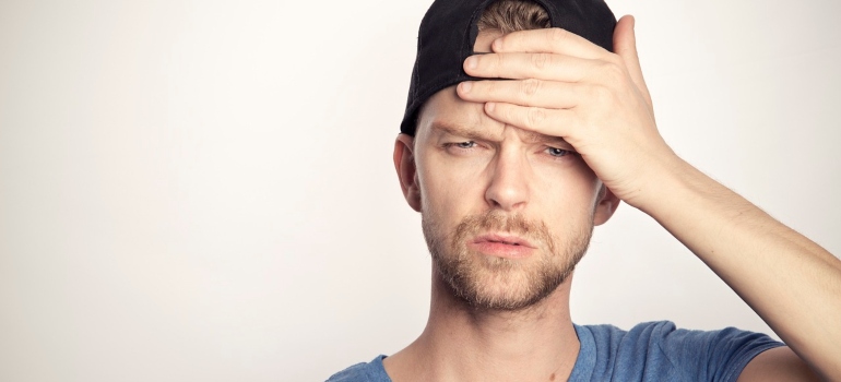 a man thinking about if he should DIY your Boca Raton move